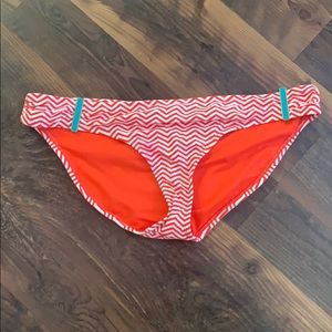 Orange, white, teal bathing suit bottoms